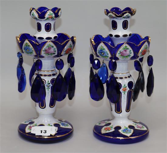 A pair of Bohemian overlaid blue glass lustres, 27.5cm
